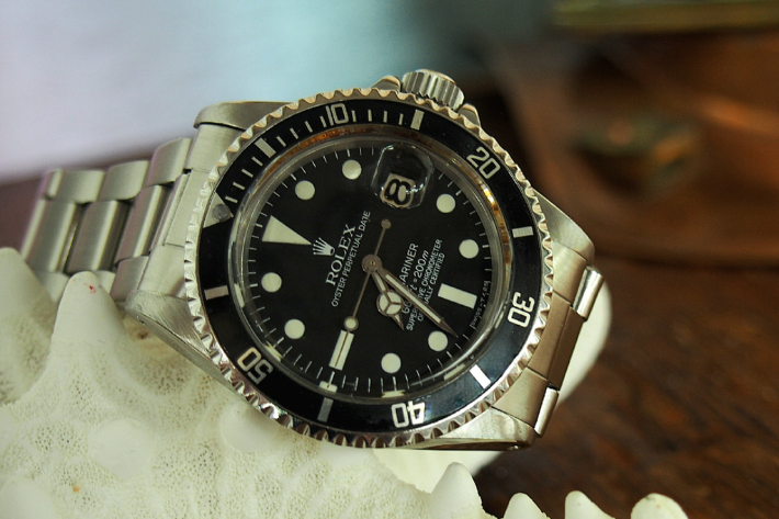 Rolex Submariner with black bezel on a starfish