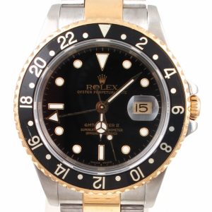 Pre-Owned 2002 Rolex GMT Master II 40MM Watch Two Tone With Black Dial and Black Bezel With Oyster Band Model 16713