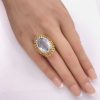 Ornate Statement Ring 14K Gold Sky Blue Topaz 18.40 Carat Solitaire hand comparison