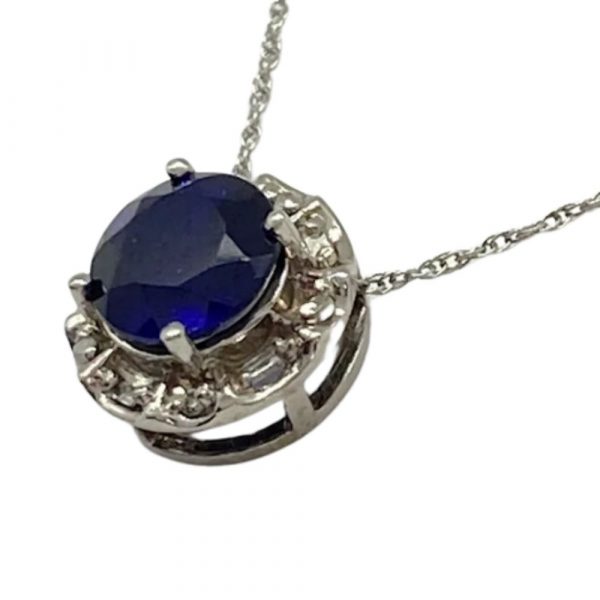 Sapphire and Diamond Halo Pendant 1.82 Carat tgw 10K White Gold close up side