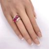 Pear Cut Lab Ruby By-Pass Ring 3.26 Carat TW 10K Two-Tone Gold hand comparison