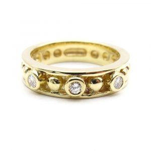 Bezel and Bead Diamond Yellow Gold Band