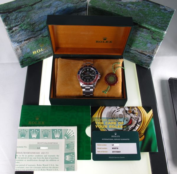 Pre-Owned Rolex GMT Master II (1989) Stainless Steel Model 16710 b and p inside