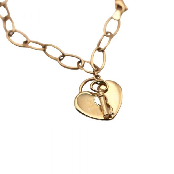 Heart lock and key oval link bracelet charm