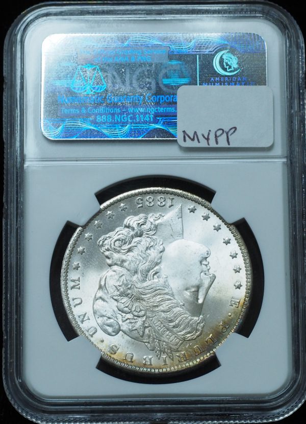 1885-O Morgan Dollar MS67 Star NGC Rainbow Crescent Toned Reverse